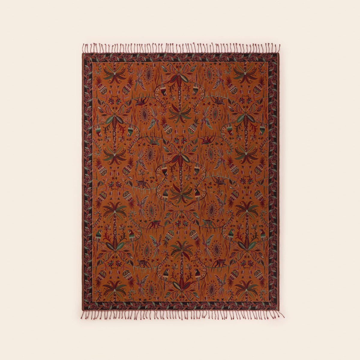 Plaid en Jacquard motif jungle SUNDARI orange et multicolore, MADURA