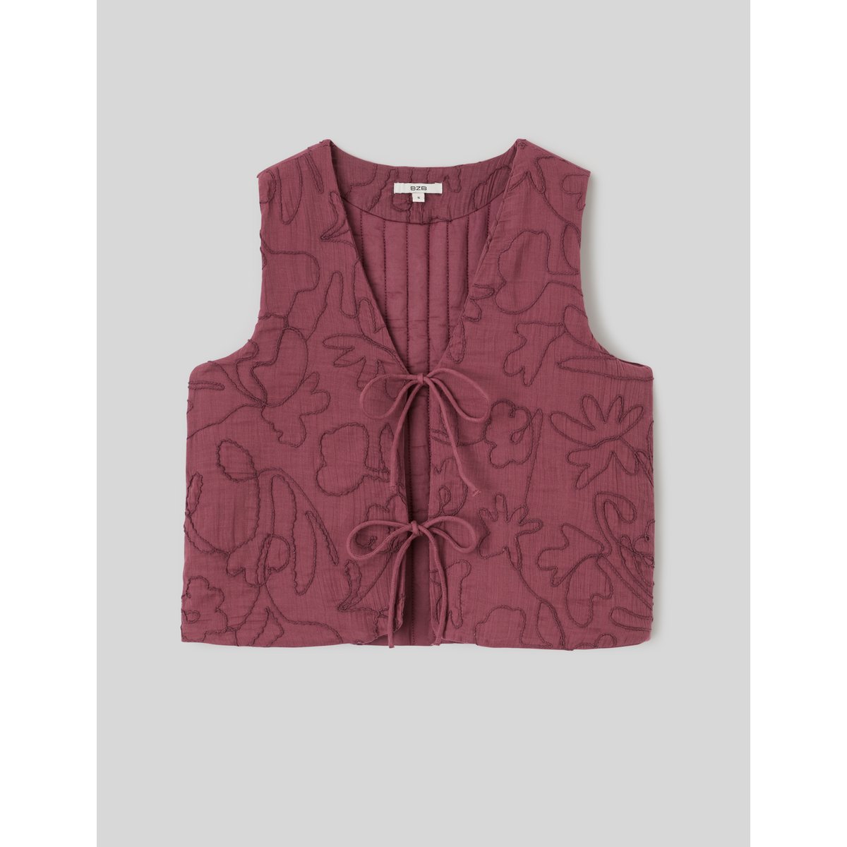 Veste sans manches pourpre, BZB