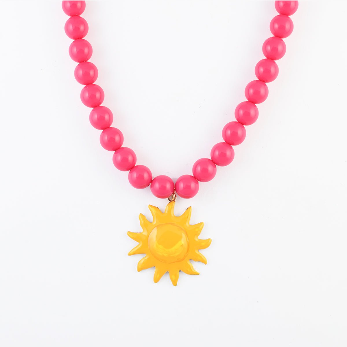 Collier de perles rose fuchsia pendentif soleil fuchsia, BALABOOSTE