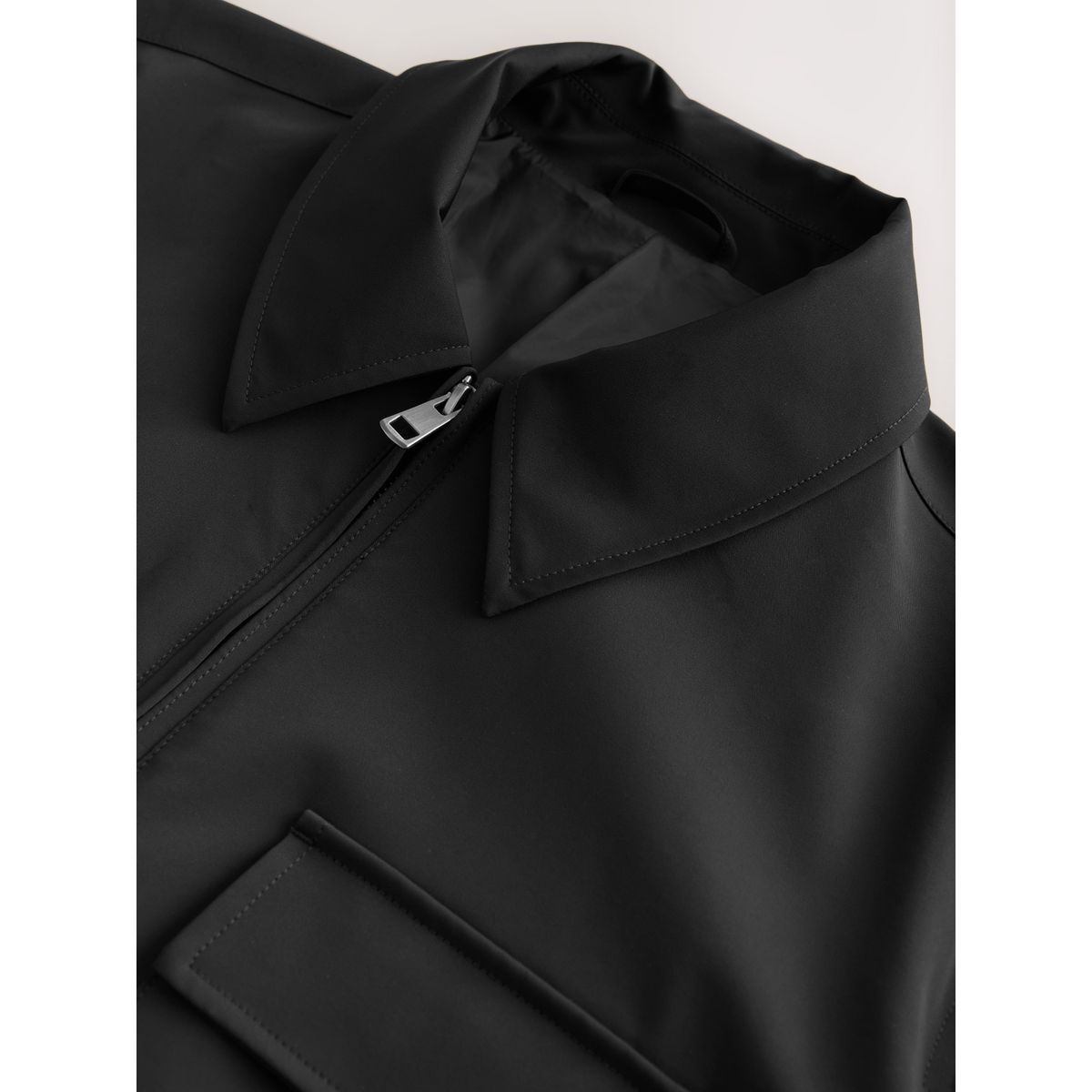 Veste à quatre poches en tissu hydrofuge noir, NEXT