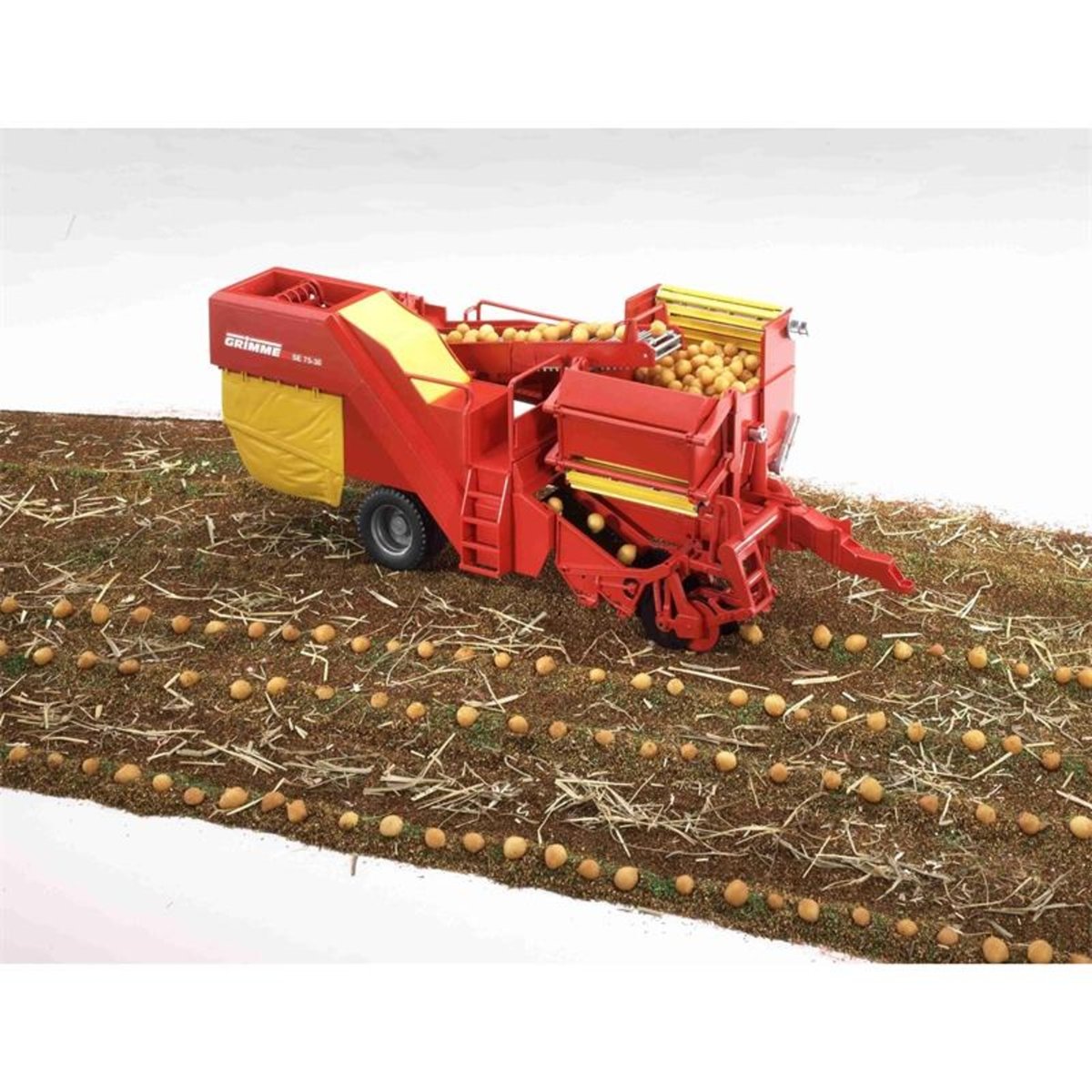 Arracheuse de pommes de terre Grimme SE 75-30 avec pommes de terre rouge et jaune, BRUDER