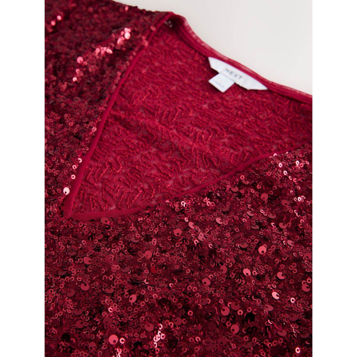 Haut à manches longues, col v et sequins rouge, NEXT