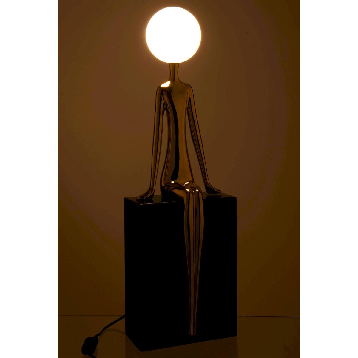 Lampe de table silhouette assise en métal doré et noir, RECOLLECTION