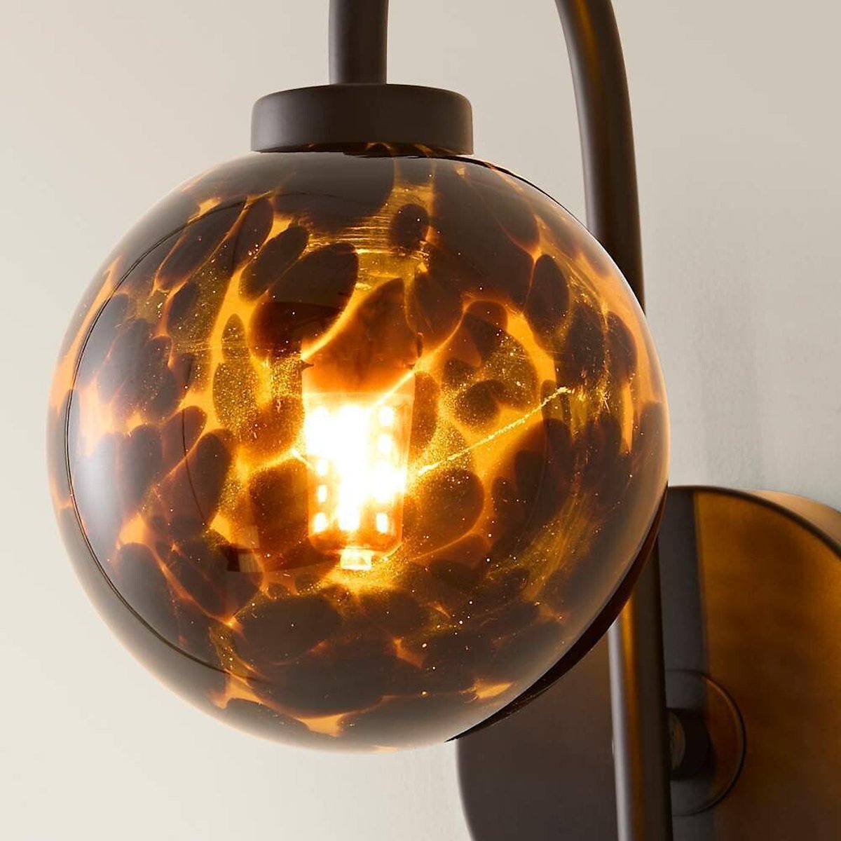 Ciara Tortoise Shell Glass Globe Wall Light black, ÉDITÉ