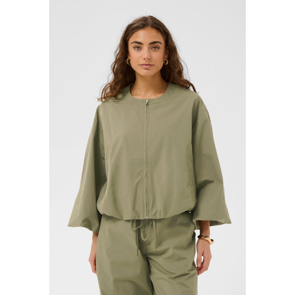 Manteau vert dusky green, CULTURE