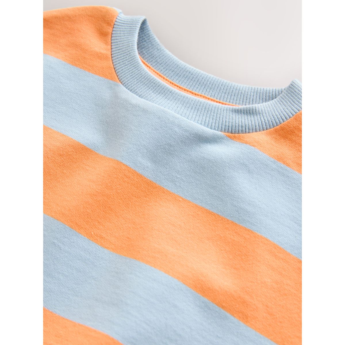 Sweat ras du cou imprimé sur l’ensemble rayures orange et bleues, NEXT