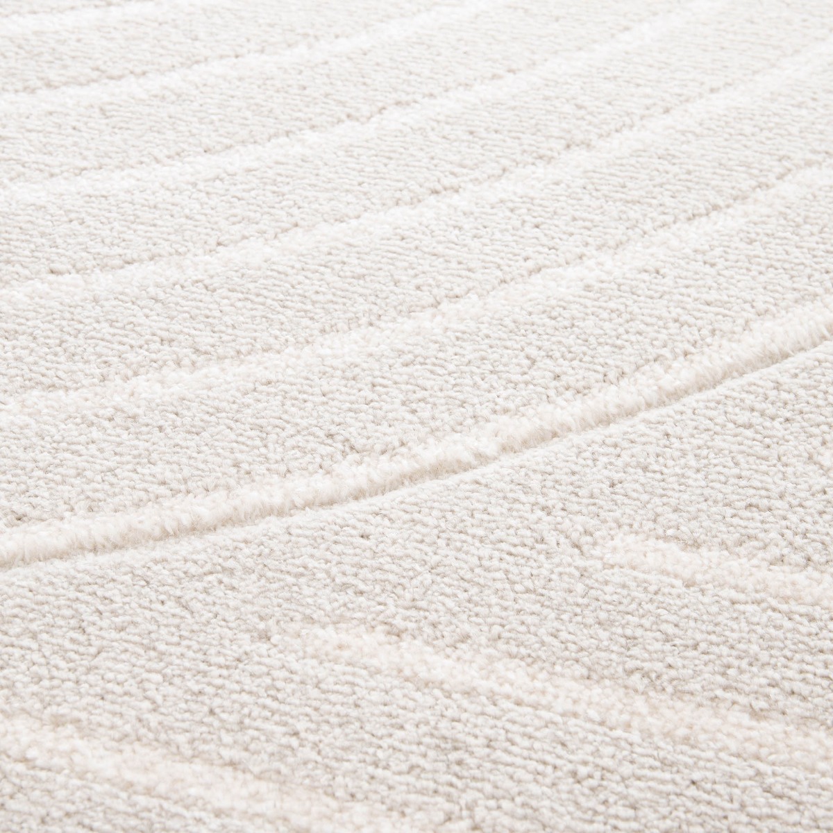 Tapis doux à relief abstrait géométrique  LUNE courbes blanches, THE DECO FACTORY
