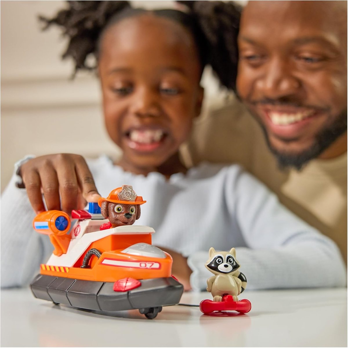 Paw Patrol Fire Rescue - Zuma avec le canot de sauvetage orange, SPIN MASTER