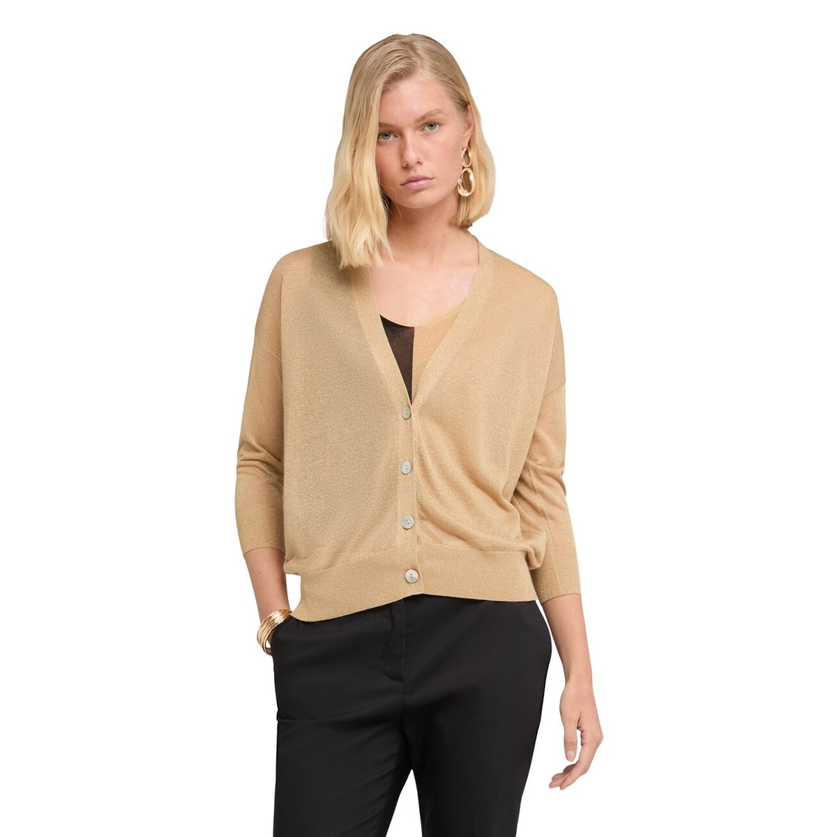 Cardigan oro, MOTIVI