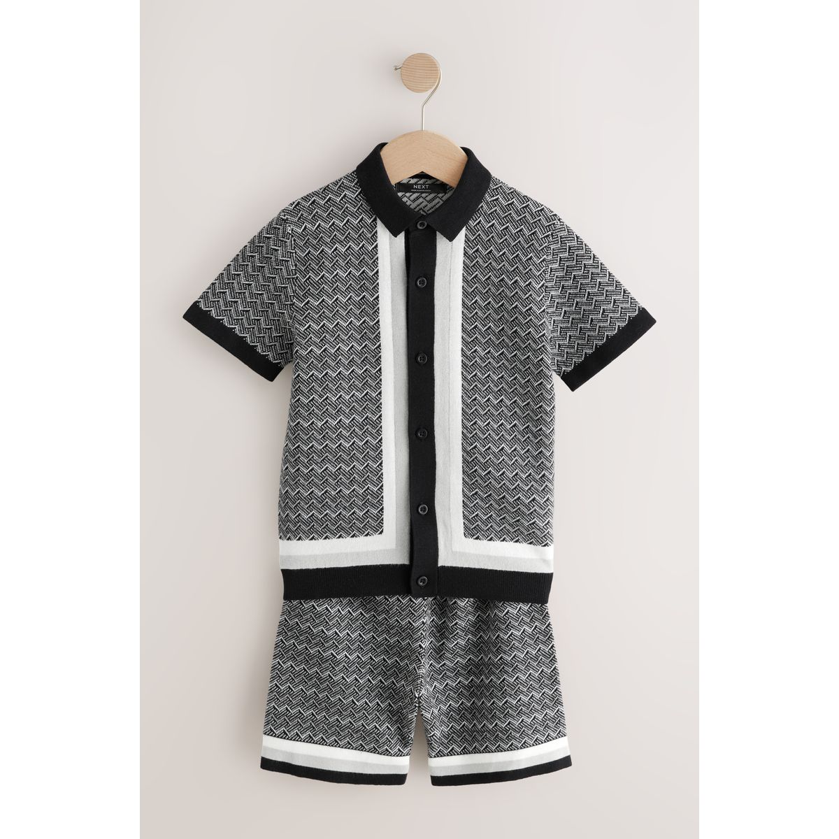 Polo en maille boutonné short monochrome, NEXT