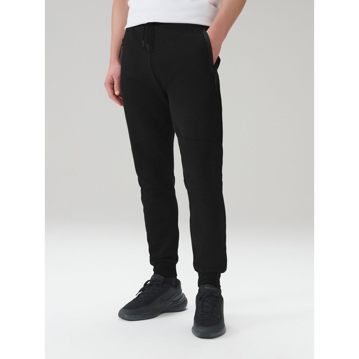Jogging slim en maille interlock noir, NEXT