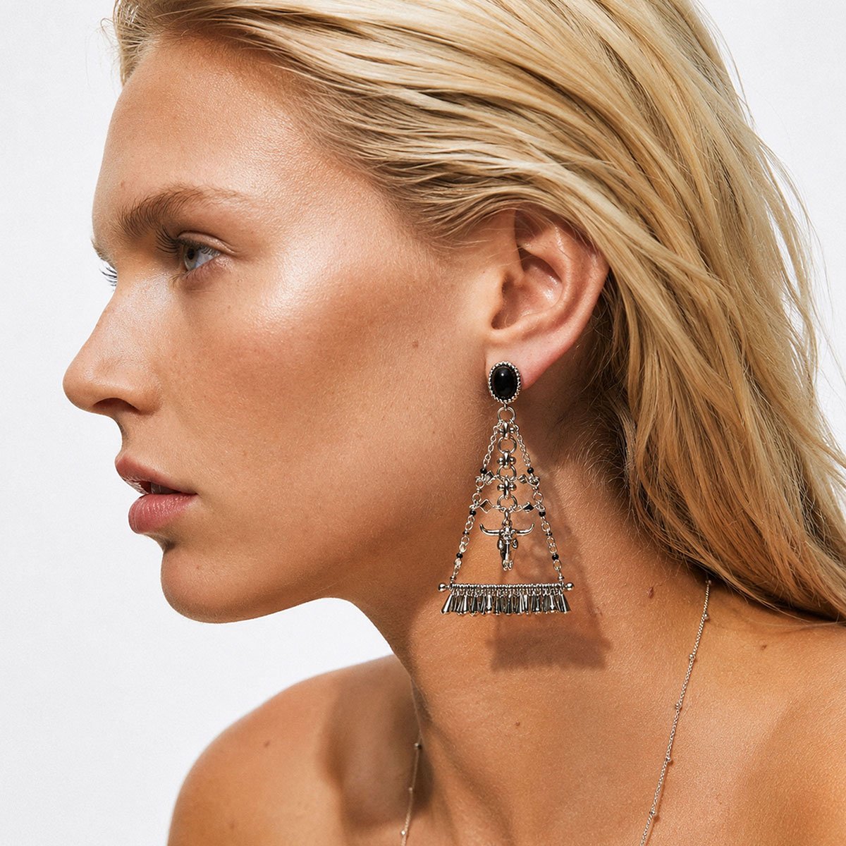Boucles d'oreilles pendantes chaînes et tête de buffle ELIM argenté, HIPANEMA