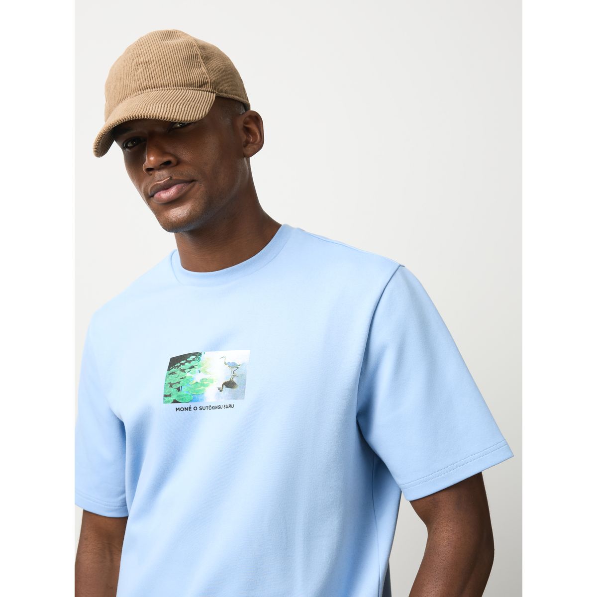 T-shirt seminal monnaie bleue o sutokingu suru, NEXT