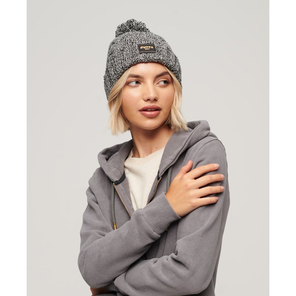 Bonnet en maille torsadée noir moucheté, SUPERDRY