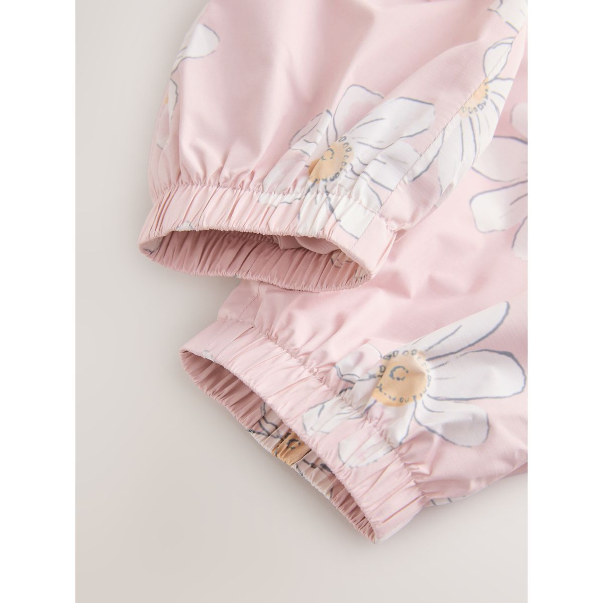 Combinaison imperméable (3 mois à 7 ans) rose motif fleurs, NEXT
