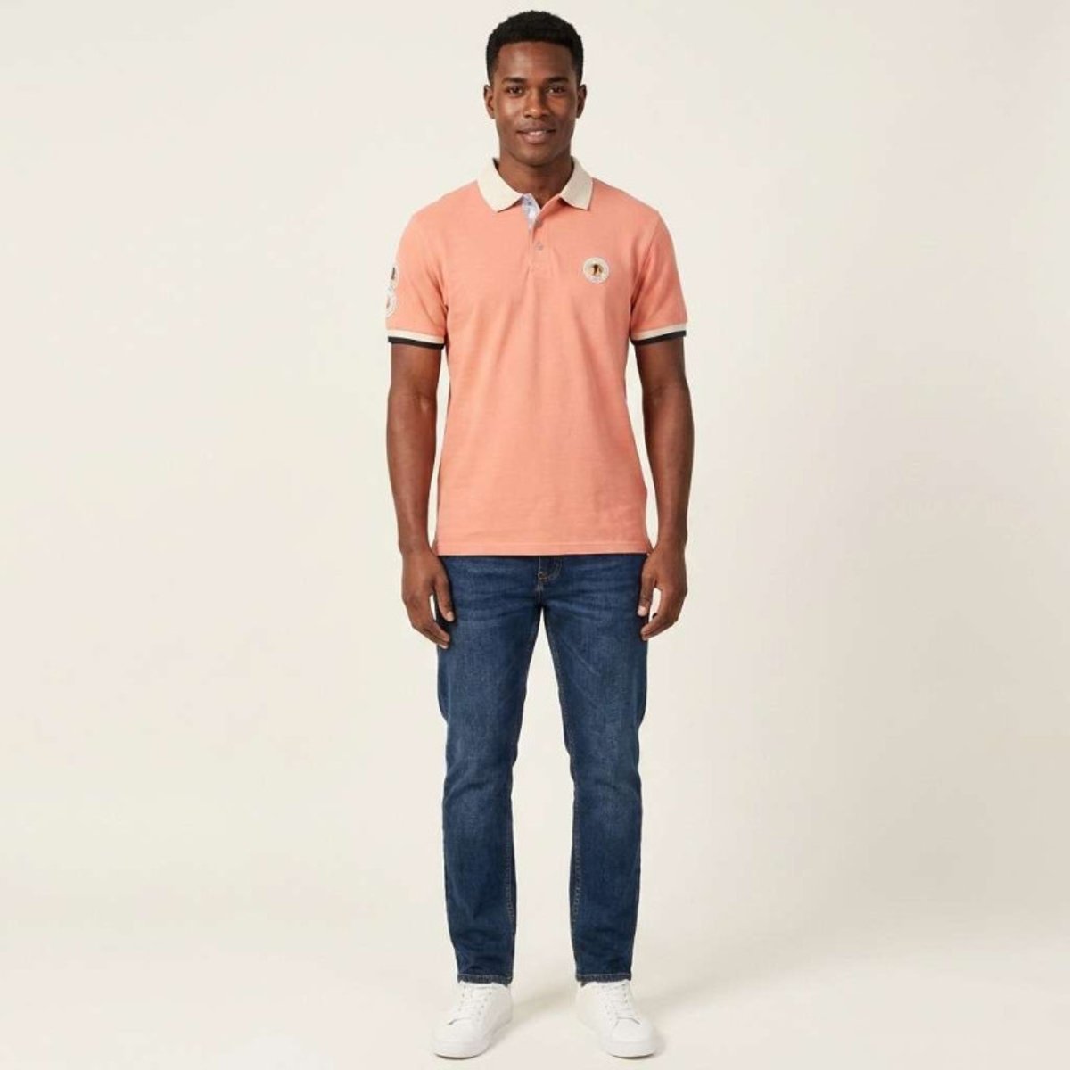 Polo en coton biologique corail uni pourvu d'un col boutonné rose, RUCKFIELD