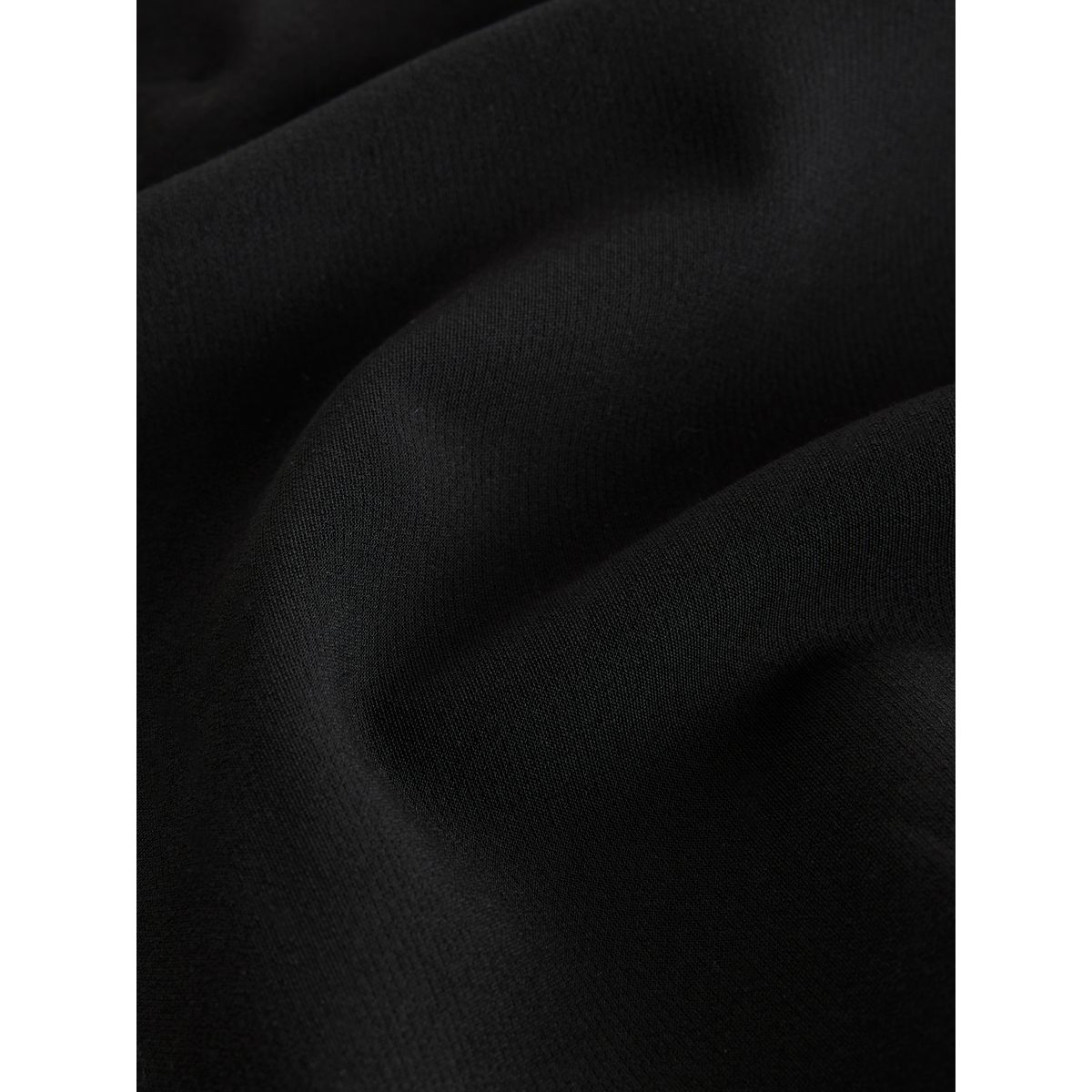 Combinaison large avec nœud à l’épaule noir, NEXT