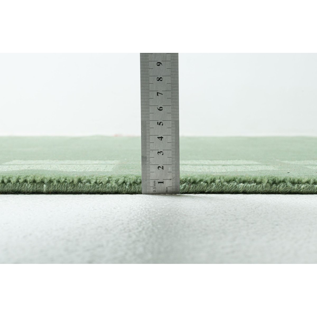 Tapis tufté Taimur à motif géométrique, laine vert, THEKO