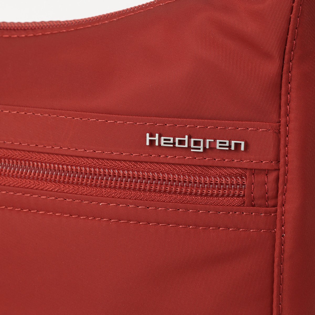 Sac bandoulière urbain avec protection RFID dahlia red, HEDGREN