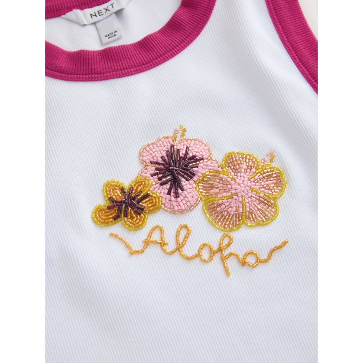 Haut sans manches à motif hibiscus blanc avec des pointes roses, NEXT