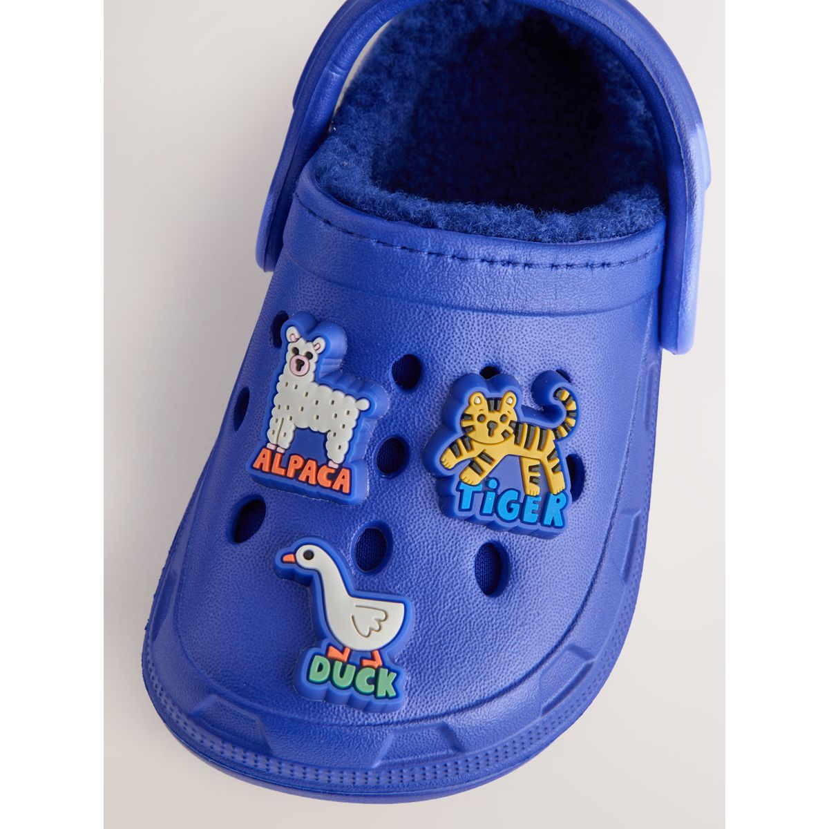 Chaussons style sabots fourrés bleu animal, NEXT