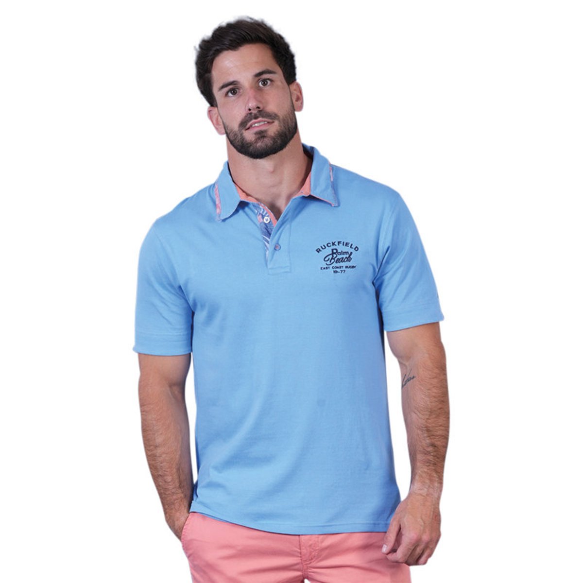Polo en coton biologique bleu uni pourvu d'un col boutonné et d'une coupe droite bleu, RUCKFIELD