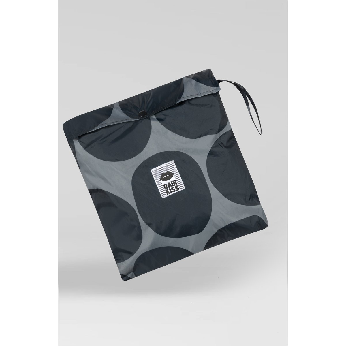 Poncho de pluie imperméable BLACK POLKA noir à pois, RAINKISS