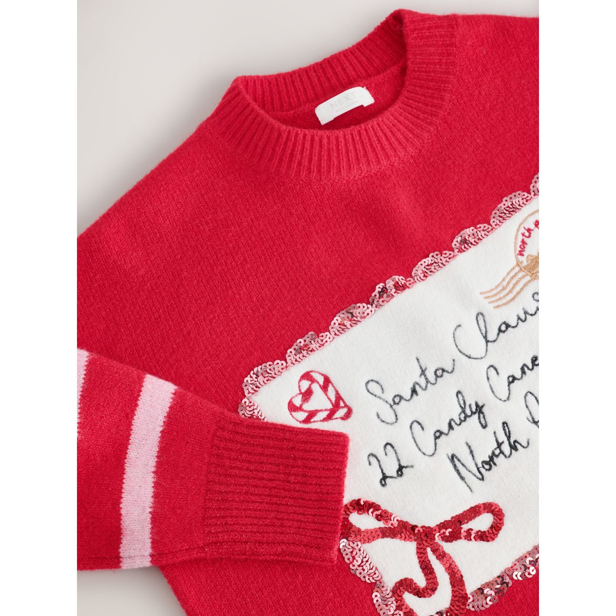 Pull de noël rouge, NEXT