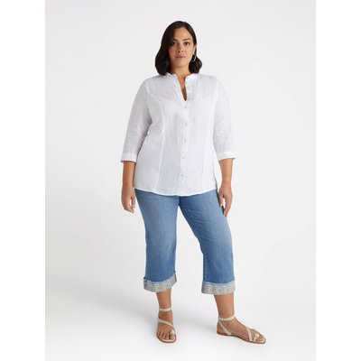 Jean cropped parfait pour l’été, revers dans le bas avec bord en dentelle cousu dessus FIORELLA RUBINO