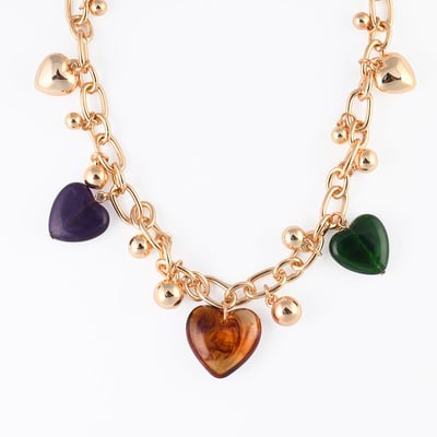 Collier chaîne à pendentifs cœurs en résine violets, marron et verts BALABOOSTE