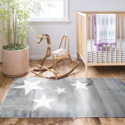 Tapis toucher laineux motifs étoiles THE DECO FACTORY