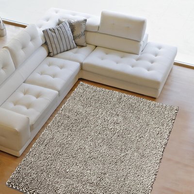 Tapis longs poils shaggy tissé en laine motif uni GRAVELA UN AMOUR DE TAPIS