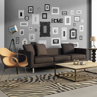 Papier peint intissé panoramique Wall full of frames EDEN