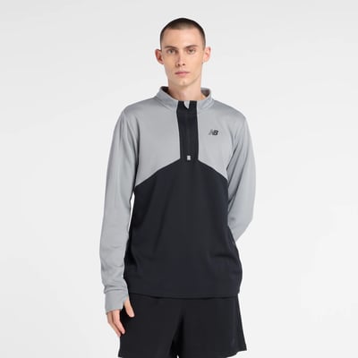 Utility Knit 1/4 Zip T-shirt col montant manches courtes. NEW BALANCE