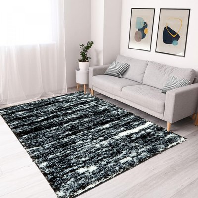 Tapis shaggy tissé motif faux uni EMBER UN AMOUR DE TAPIS