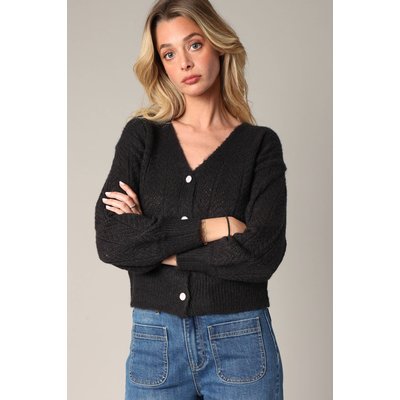 Pull en maille ajourée avec boutons nacrés
 DORFI DEELUXE