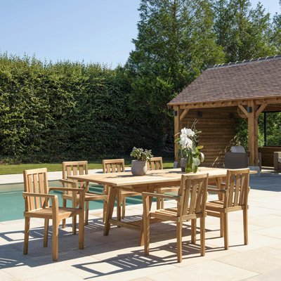 Salon de jardin teck brut table pieds tréteaux 180/240 + 6 fauteuils SUMMER PIER IMPORT