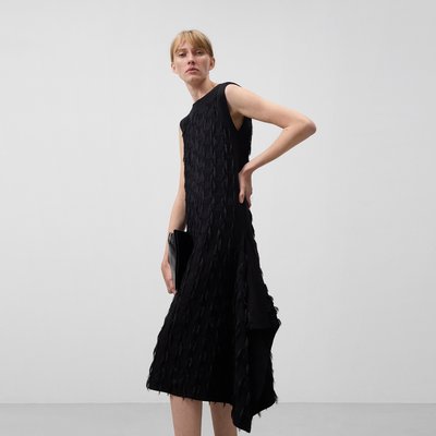 Robe en maille à franges. ADOLFO DOMINGUEZ