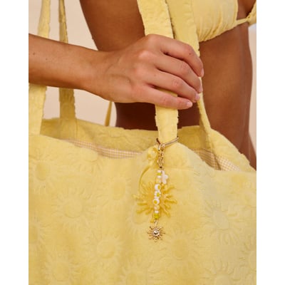Porte-clé doré avec charms soleil et cœur SUNLEMIZ UNDIZ