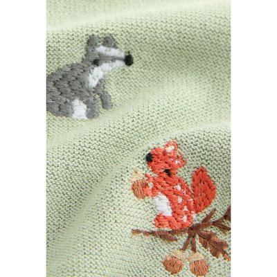 Polo en maille avec broderie sur l’ensemble NEXT