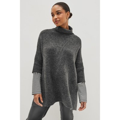 Poncho en maille avec rayures sur les manches NEXT