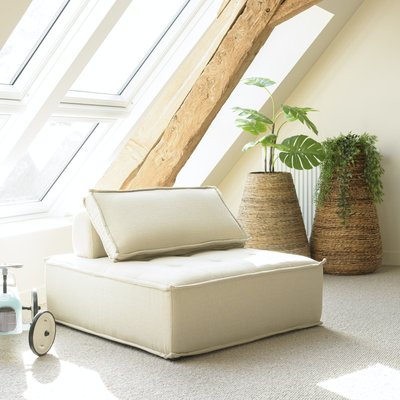 Fauteuil chauffeuse tissu capitonné beige avec coussin PIER IMPORT