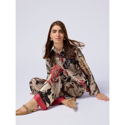 Pantalon palazzo réalisé en satin à motif feuillage OLTRE