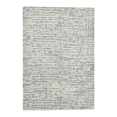 Tapis tufté main en laine vierge et viscose THEKO