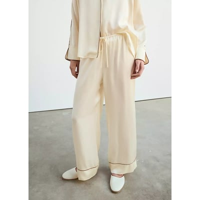 Pantalon en viscose satinée avec passepoil contrastant MANGO
