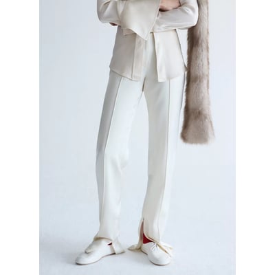 Pantalon satiné fente à l’ourlet MANGO