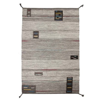 Tapis de salon en laine aspect ethnique avec pompons  TRIBAL THE DECO FACTORY
