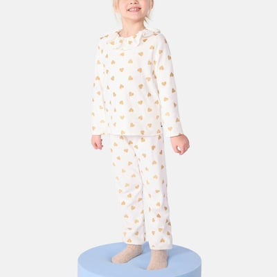 Pyjama en coton, imprimé coeur coloris doré PETIT BATEAU