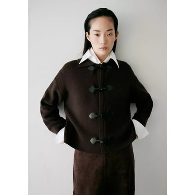Veste en maille à brandebourgs MANGO
