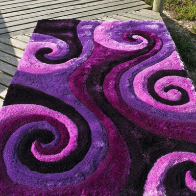 Tapis shaggy fait main motif rond ADAMASTOR UN AMOUR DE TAPIS